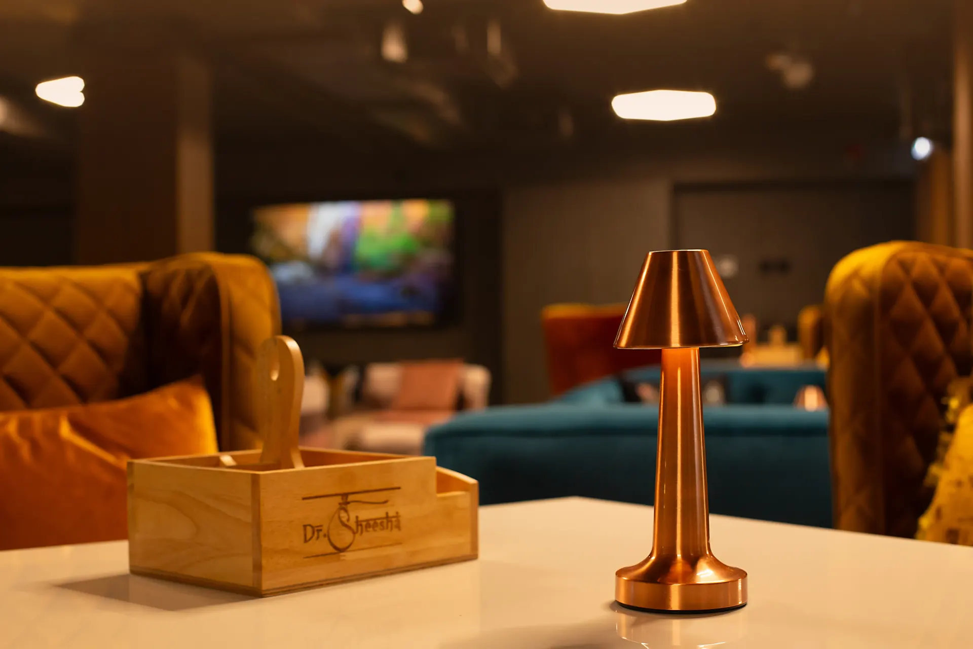 Warm lounge seating at Dr. Sheesha, a shisha lounge in Al Karama, Dubai